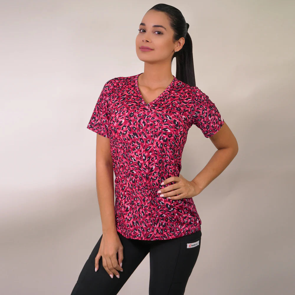 Delantal clinico Mujer tela elasticada estampada. Combina con Fucsia y Negro